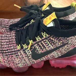 Nike Flyknit Sneakers with Pink and Black Accents